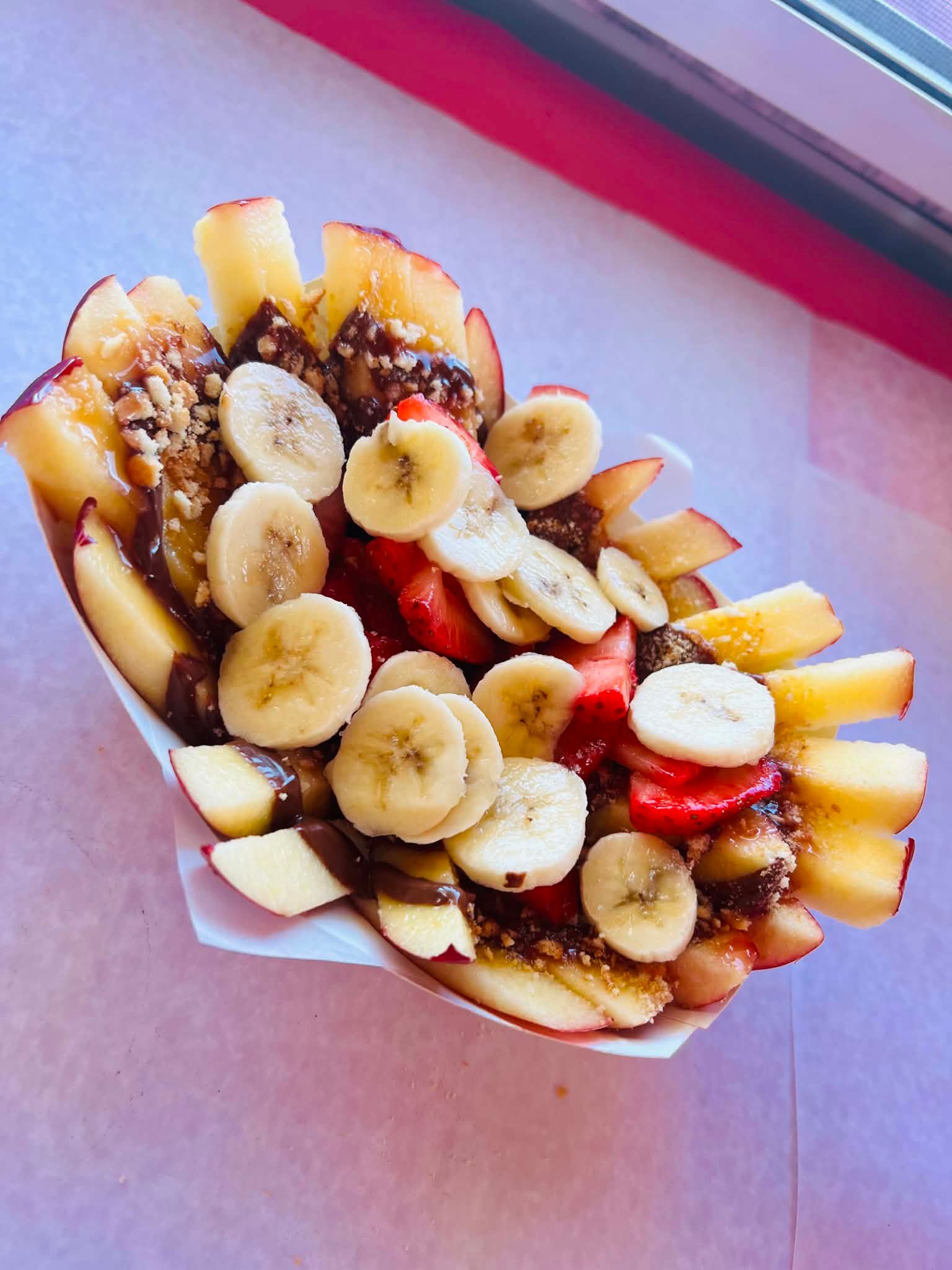 Loaded apple fries with banana, Nutella and strawberries